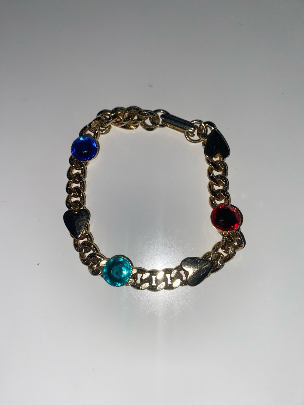 Gold Chain Bracelet with Red, Blue & Teal Gem Accents